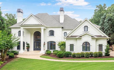 brick house white metal balcony|white brick exterior homes.